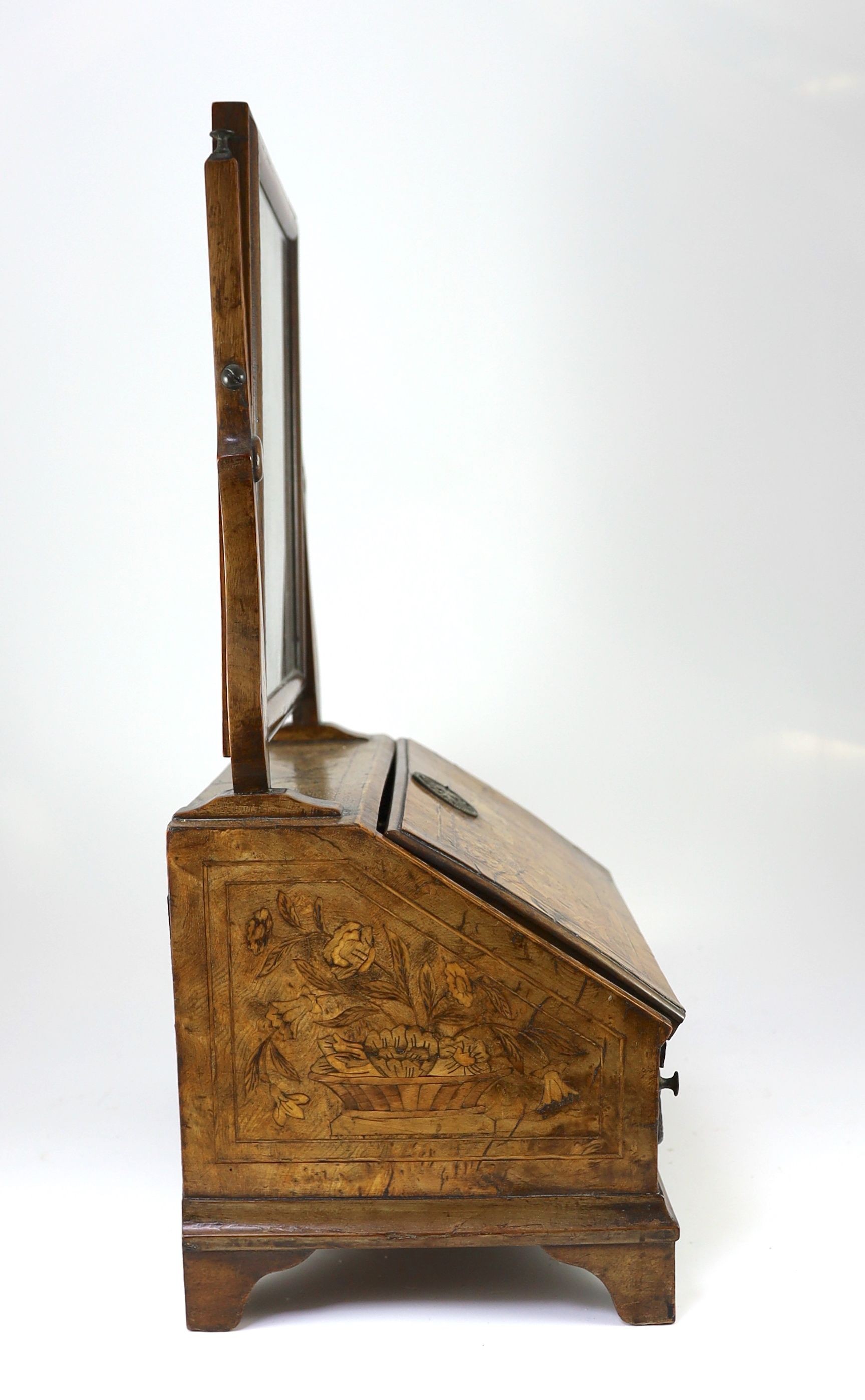 A mid to late 18th century Dutch walnut and marquetry toilet mirror bureau